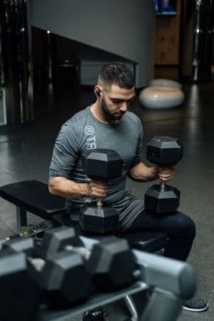A men with dumbells in hands